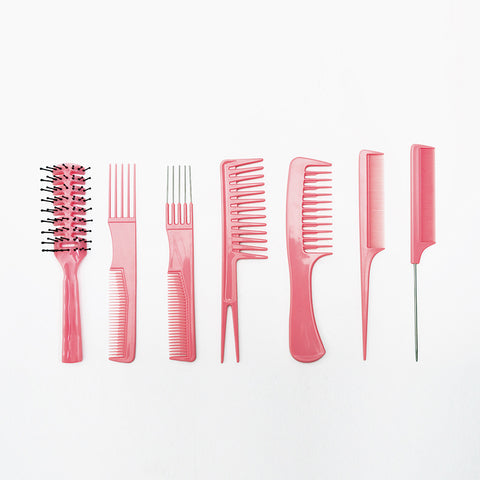 Set of 7 pink combs with case